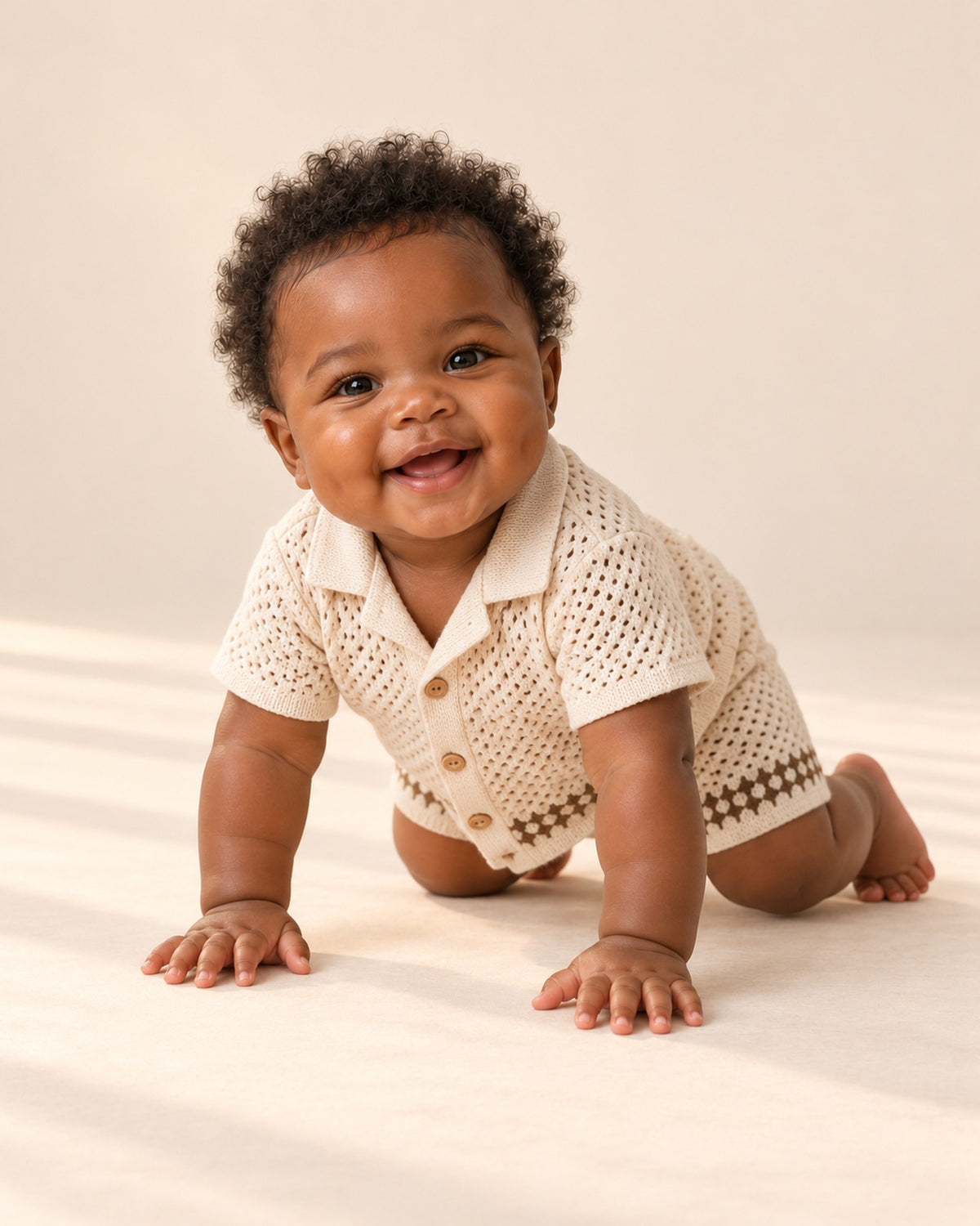 Baby at play in the openwork knit camp collar set – Oat