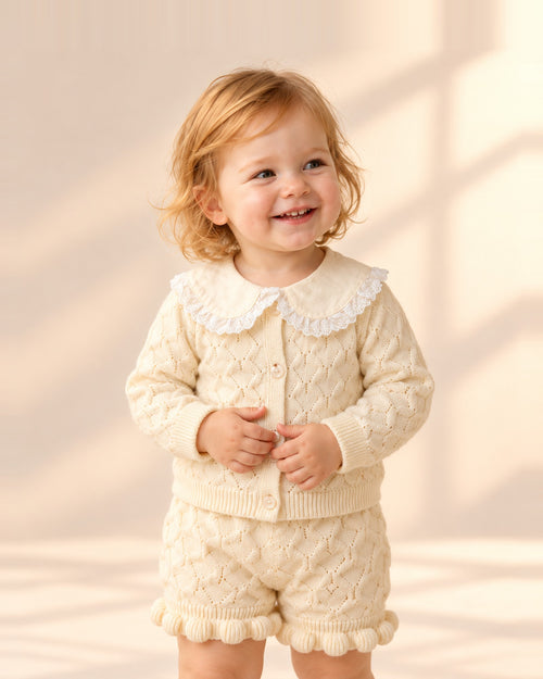 Toddler in the Bonnie Popcorn Knit Set, close-up – Cream