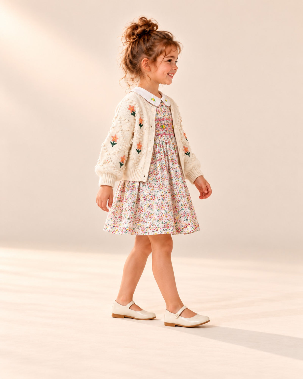 Side view showing the gathered skirt and puff sleeves – Pink Floral
