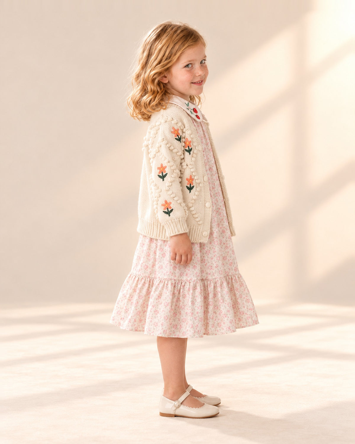 Side view showing the flounce hem and cardigan – Pink Floral