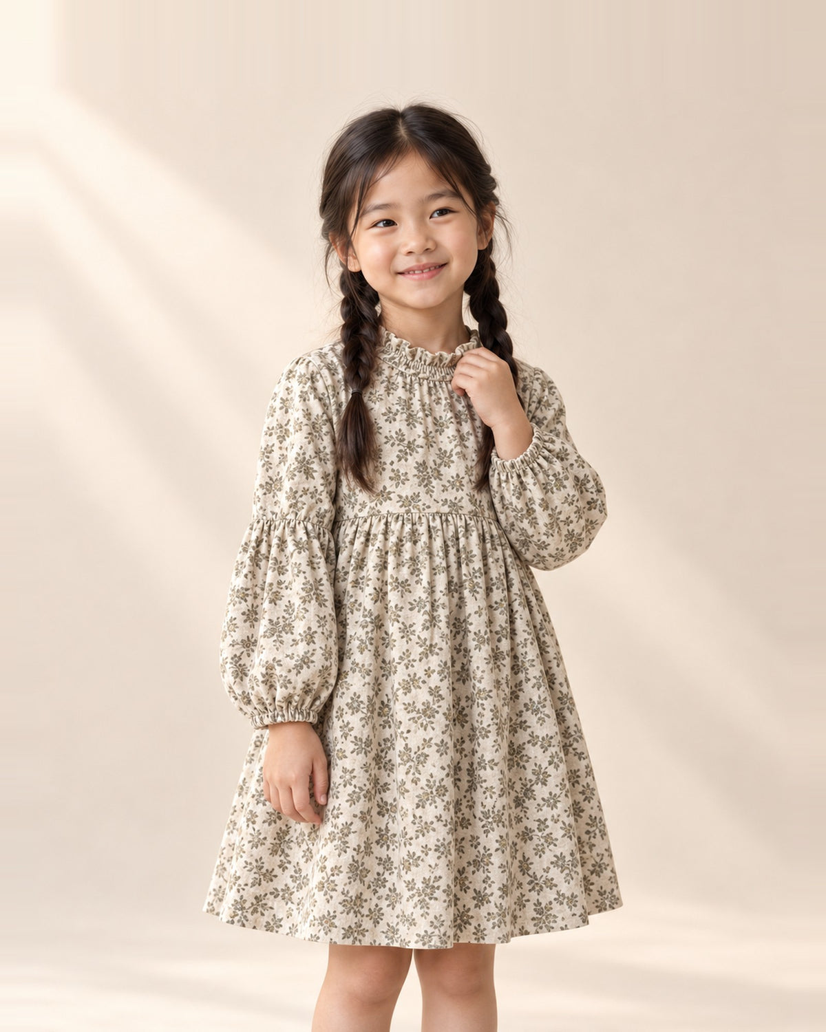 Girl in the Edith cream vintage floral dress with a ruffled high neck – Cream Floral