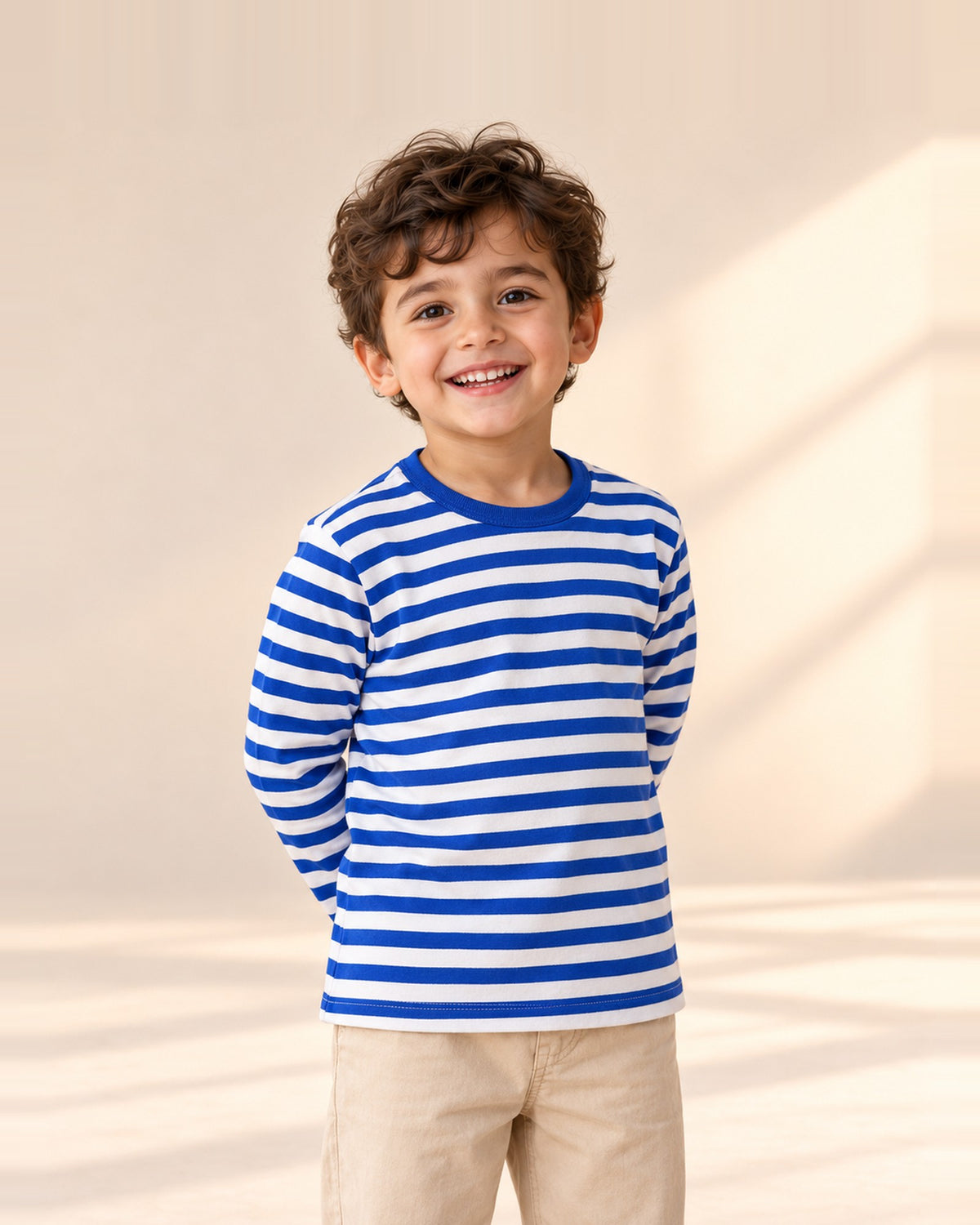 Boy in the Milo blue and white Breton stripe tee – Blue Stripe