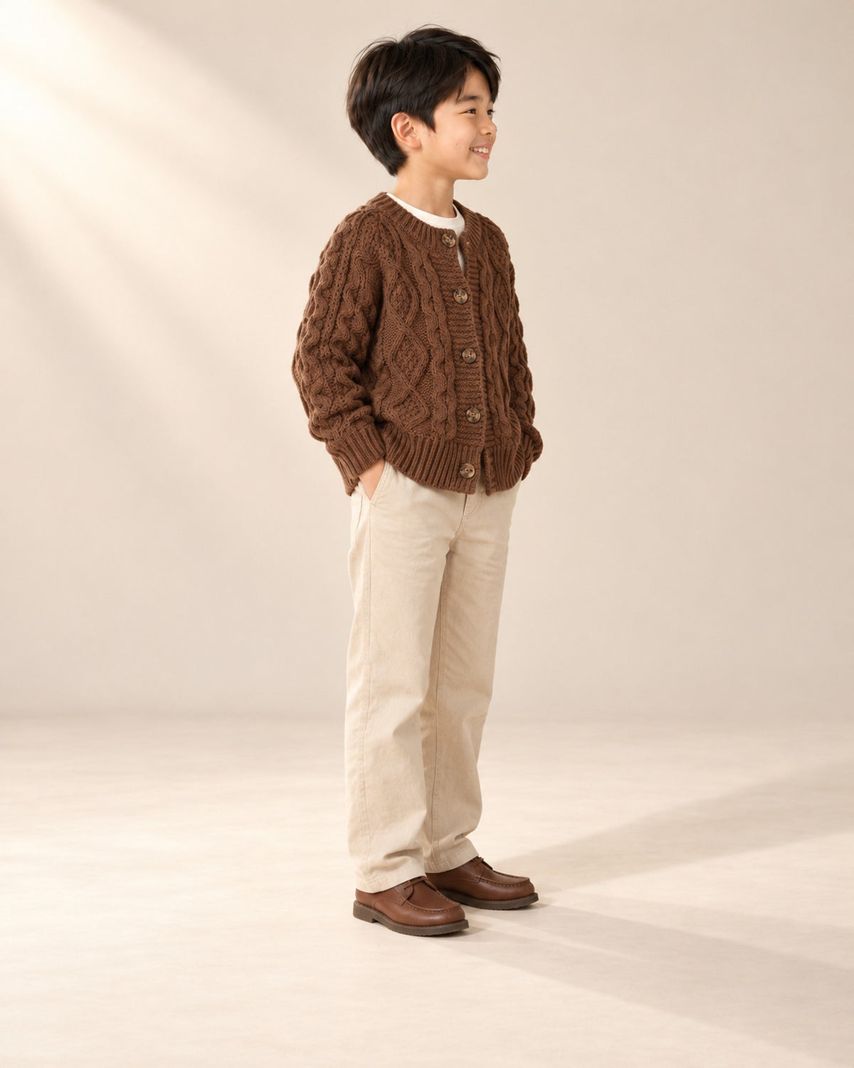 Oscar Chunky Cable Cardigan in Chocolate – side view