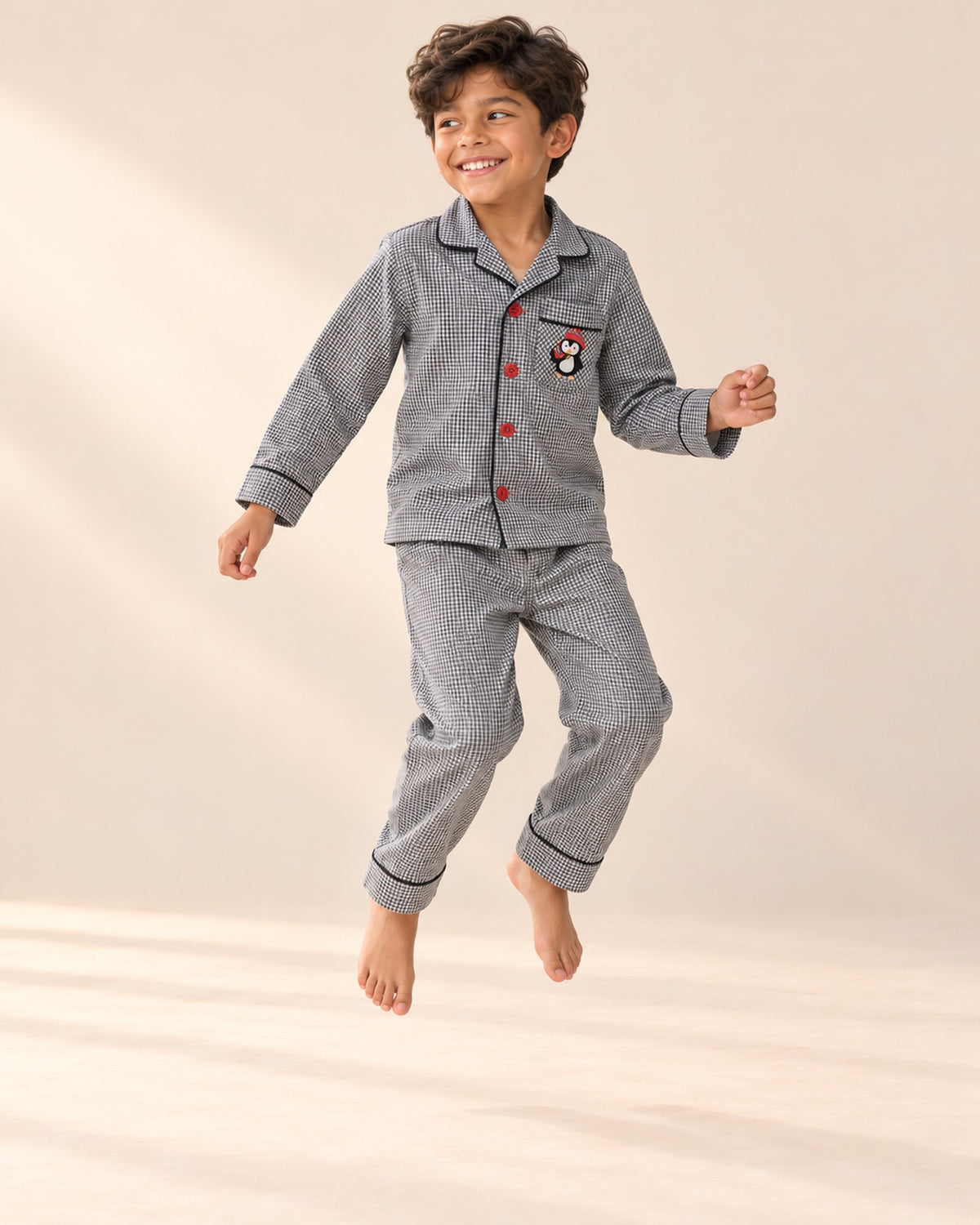 Penguin Gingham Pajama Set – natural pose – Grey Gingham