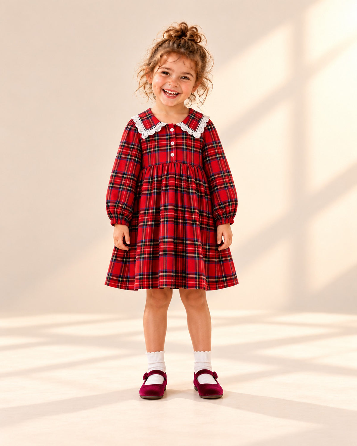Front view of a girl in a red tartan dress and burgundy velvet Mary Janes, full length – Burgundy