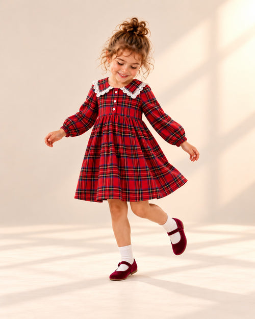 Girl twirling in the tartan dress and burgundy Mary Janes – Burgundy