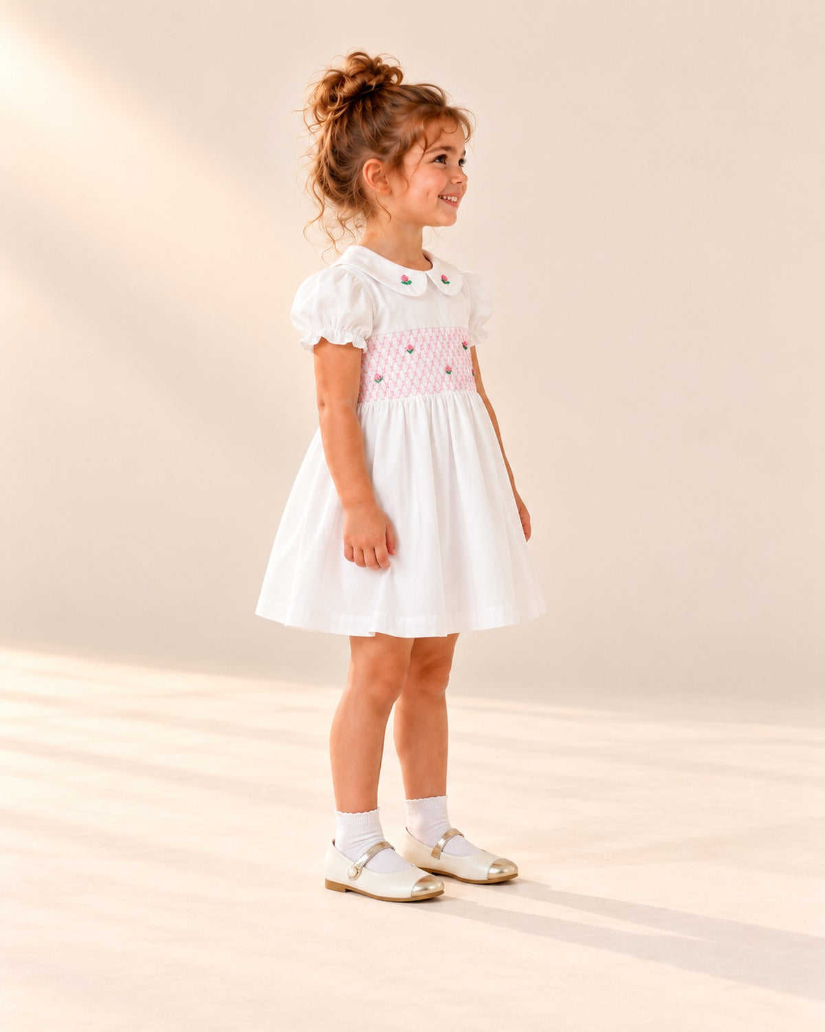 Side view of the white Mary Jane with gold toe cap and ankle sock – White