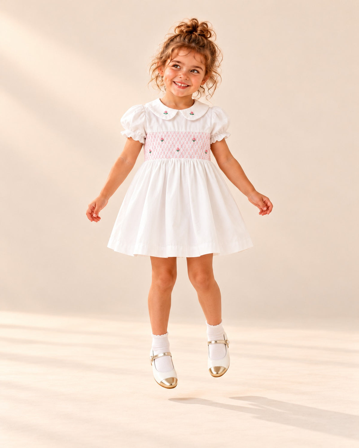 Girl in the white smock dress and gold-toe Mary Janes, head to toe – White