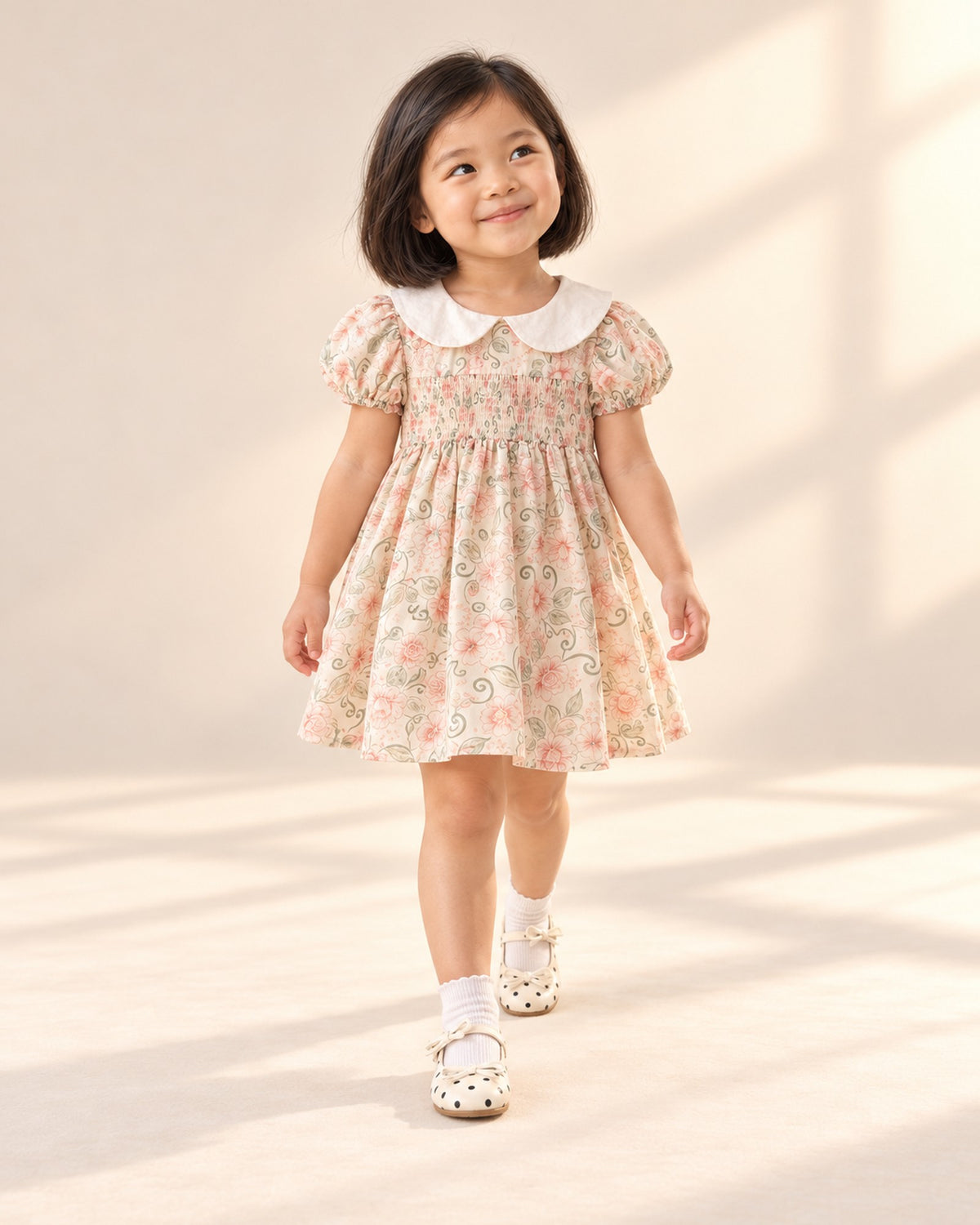 Girl in the floral smock dress and polka dot Mary Janes, head to toe – Cream Dot