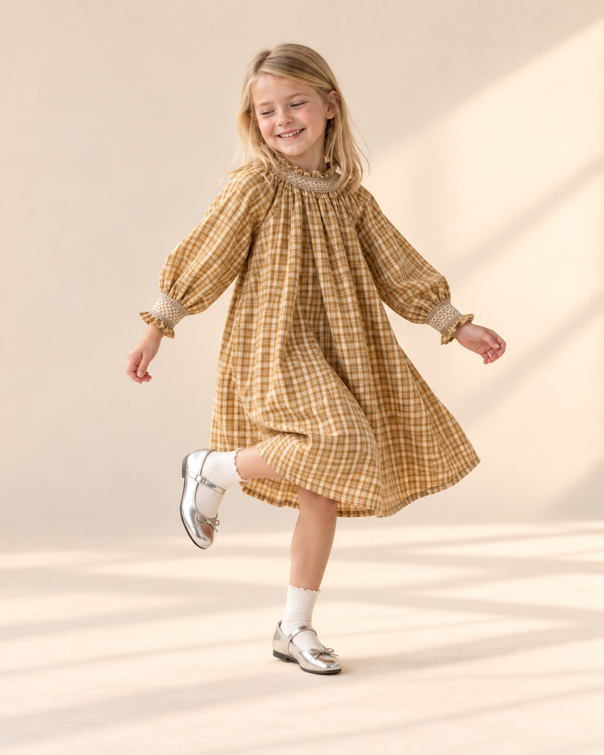 Girl in the ochre check dress and silver Mary Janes, head to toe – Silver