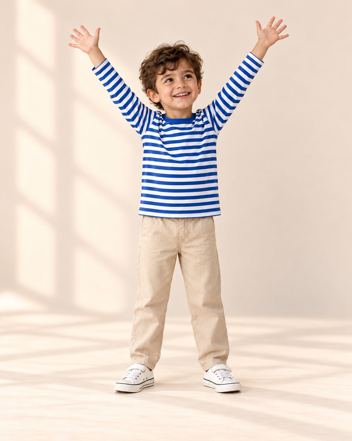 Child in the striped tee and white canvas sneakers, head to toe – White
