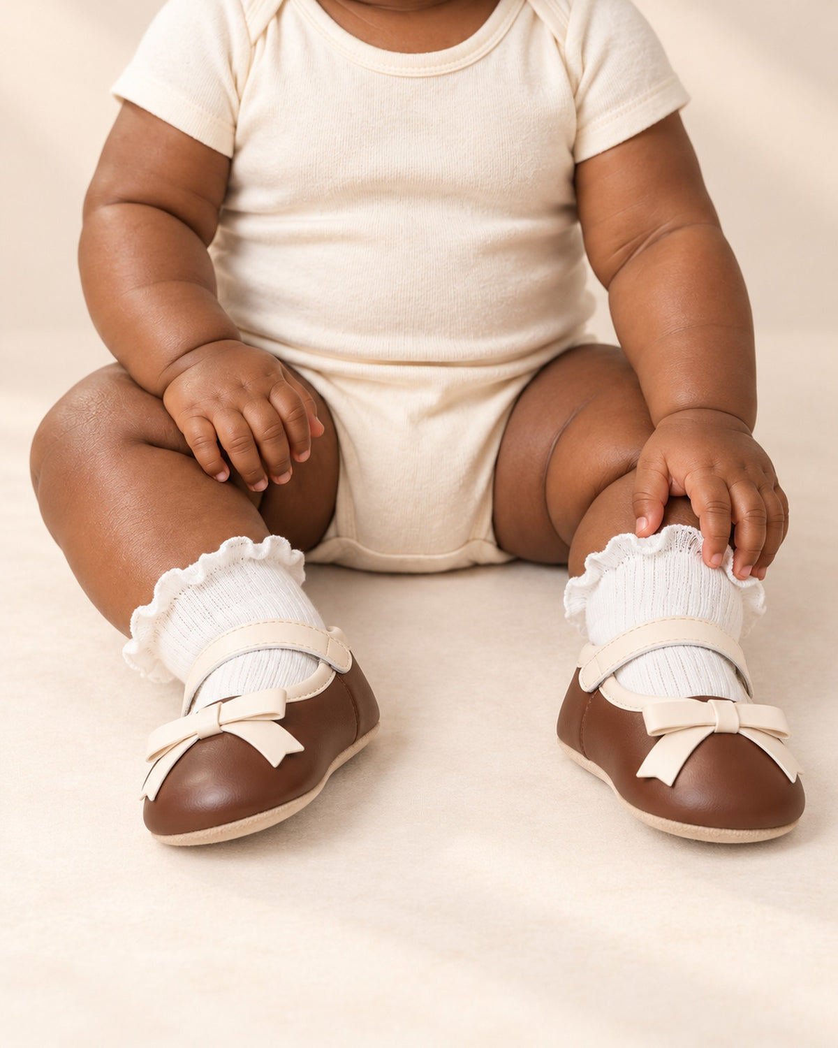 White ribbed baby socks with a frilled lettuce edge