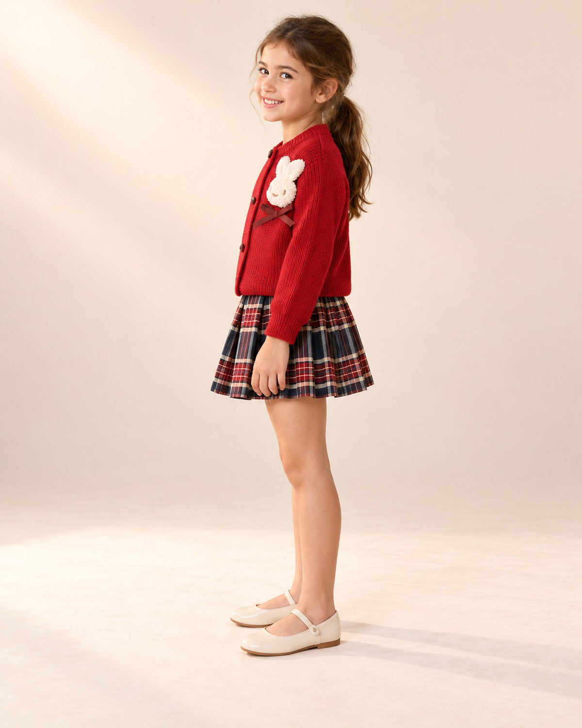 Side view of the set showing the pleated skirt – Red