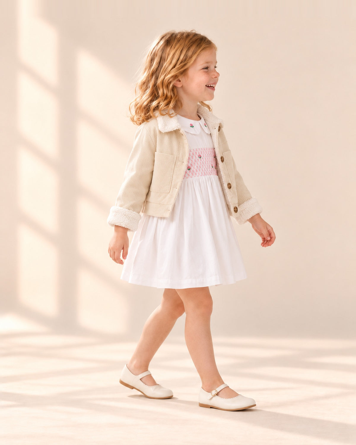Side view showing the full skirt and puff sleeves – White