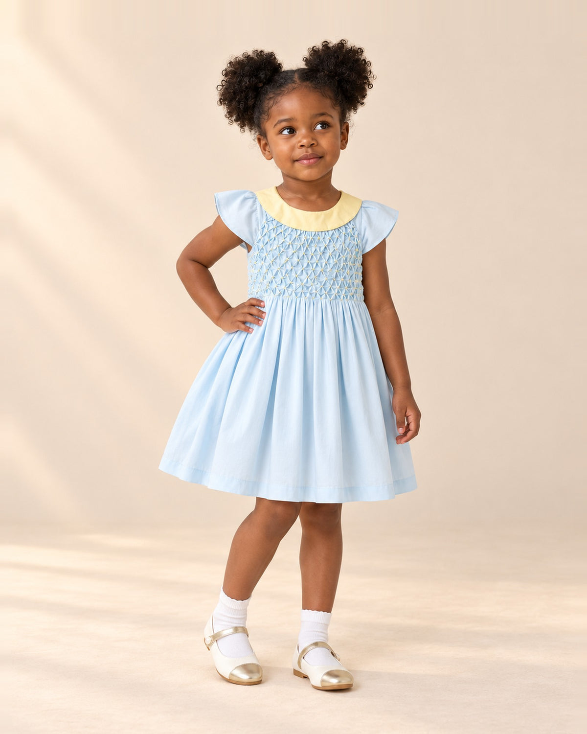 Light blue smocked dress with a yellow round collar and flutter sleeves – Light Blue