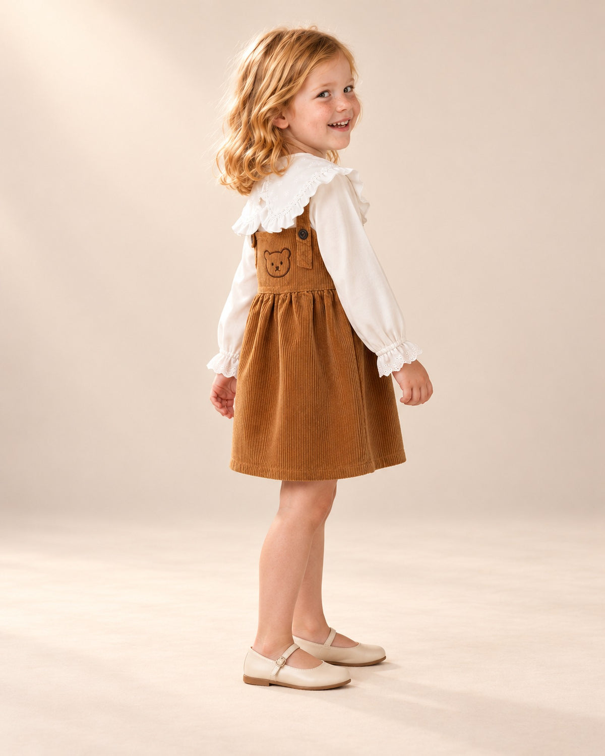 Betsy Teddy Corduroy Pinafore in Caramel – side view