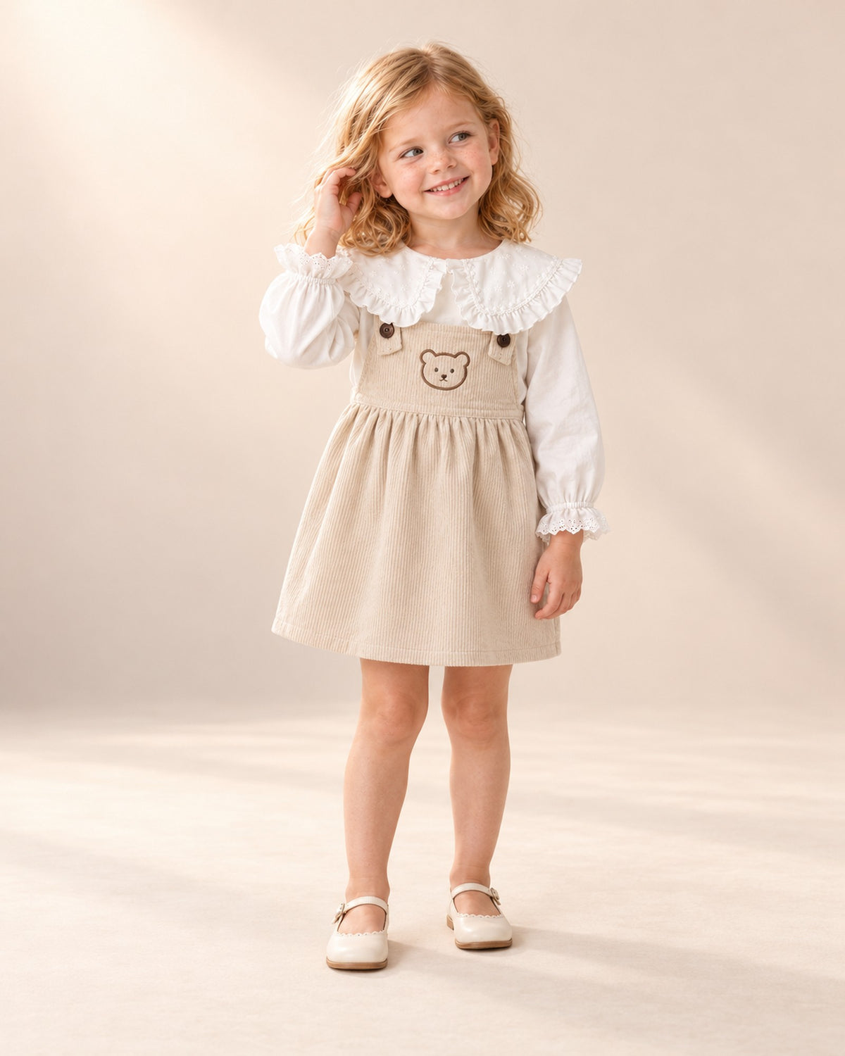 Betsy Teddy Corduroy Pinafore in Oatmeal – full front view