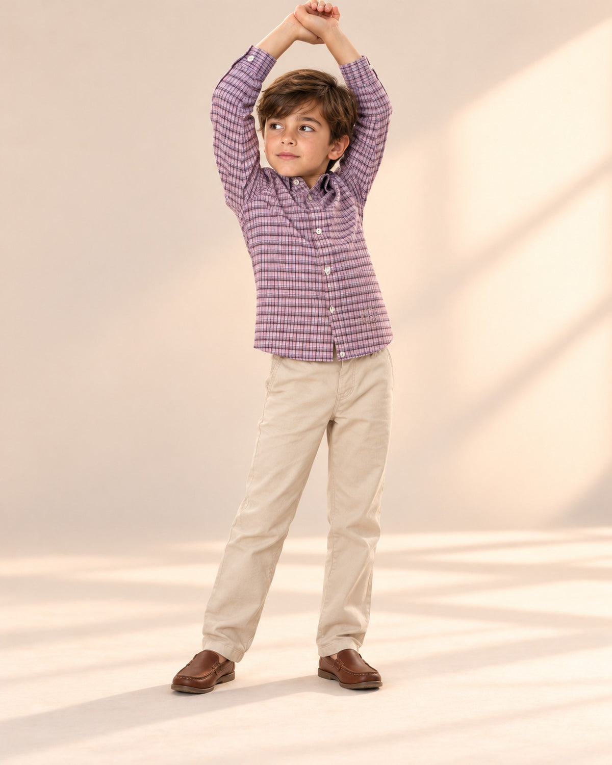 Boy stretching his arms overhead in the lilac check shirt – Lilac Check