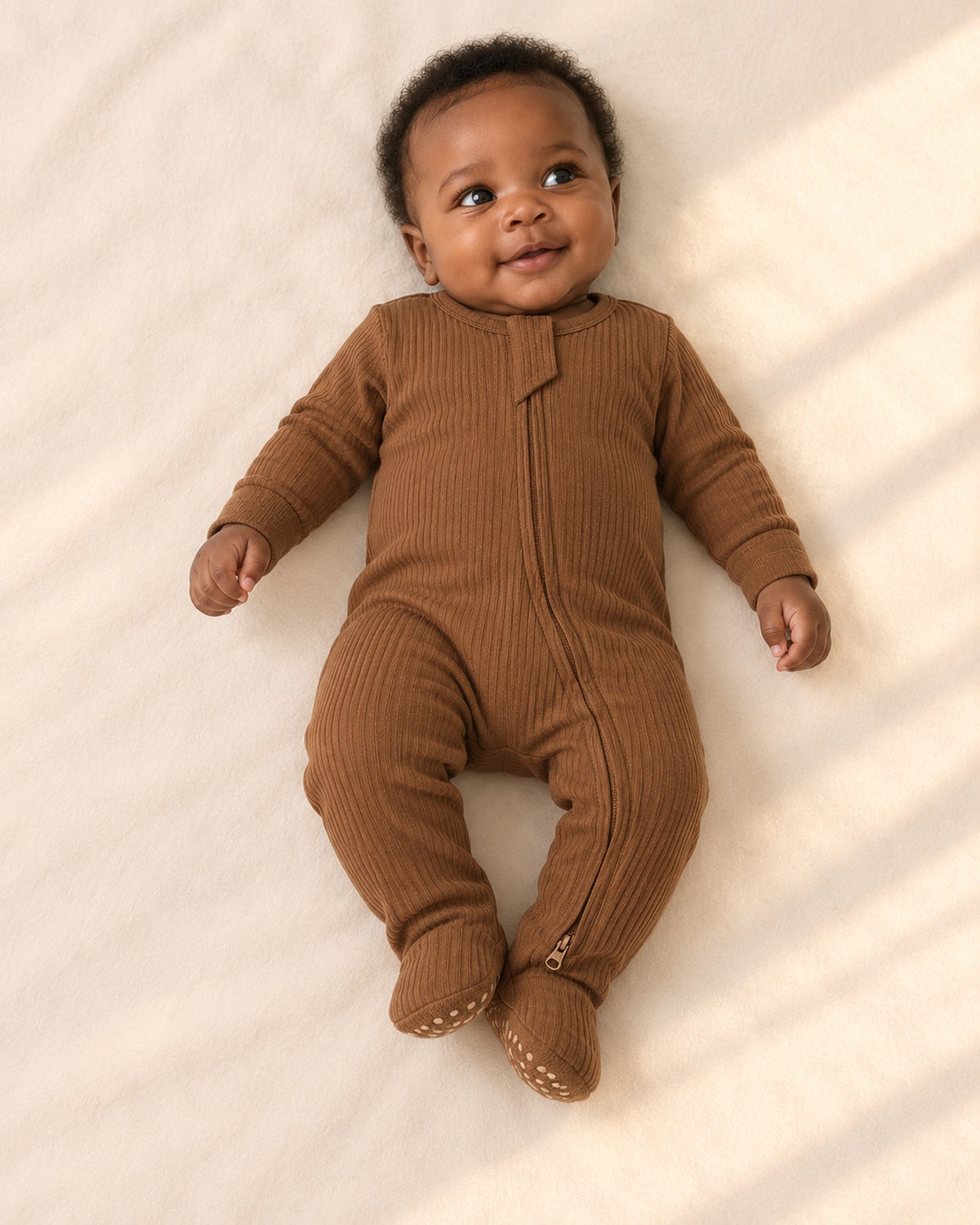 Cubby Ribbed Zip Footie in Caramel – main