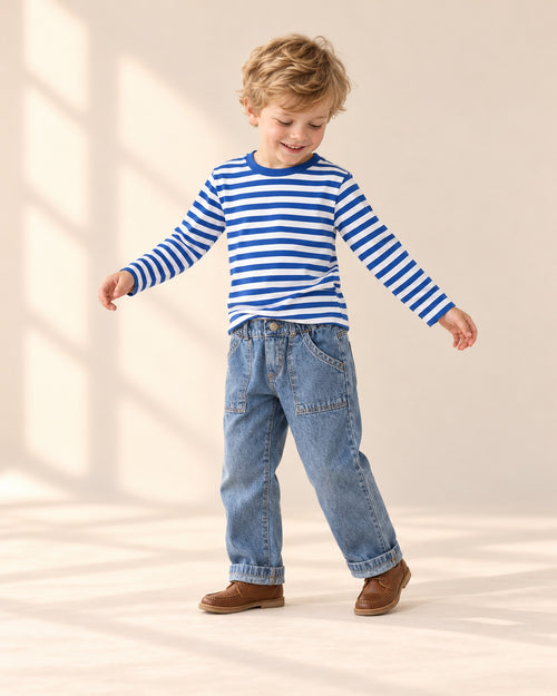 Boy standing at ease in the mid-wash jeans and striped tee – Mid Wash