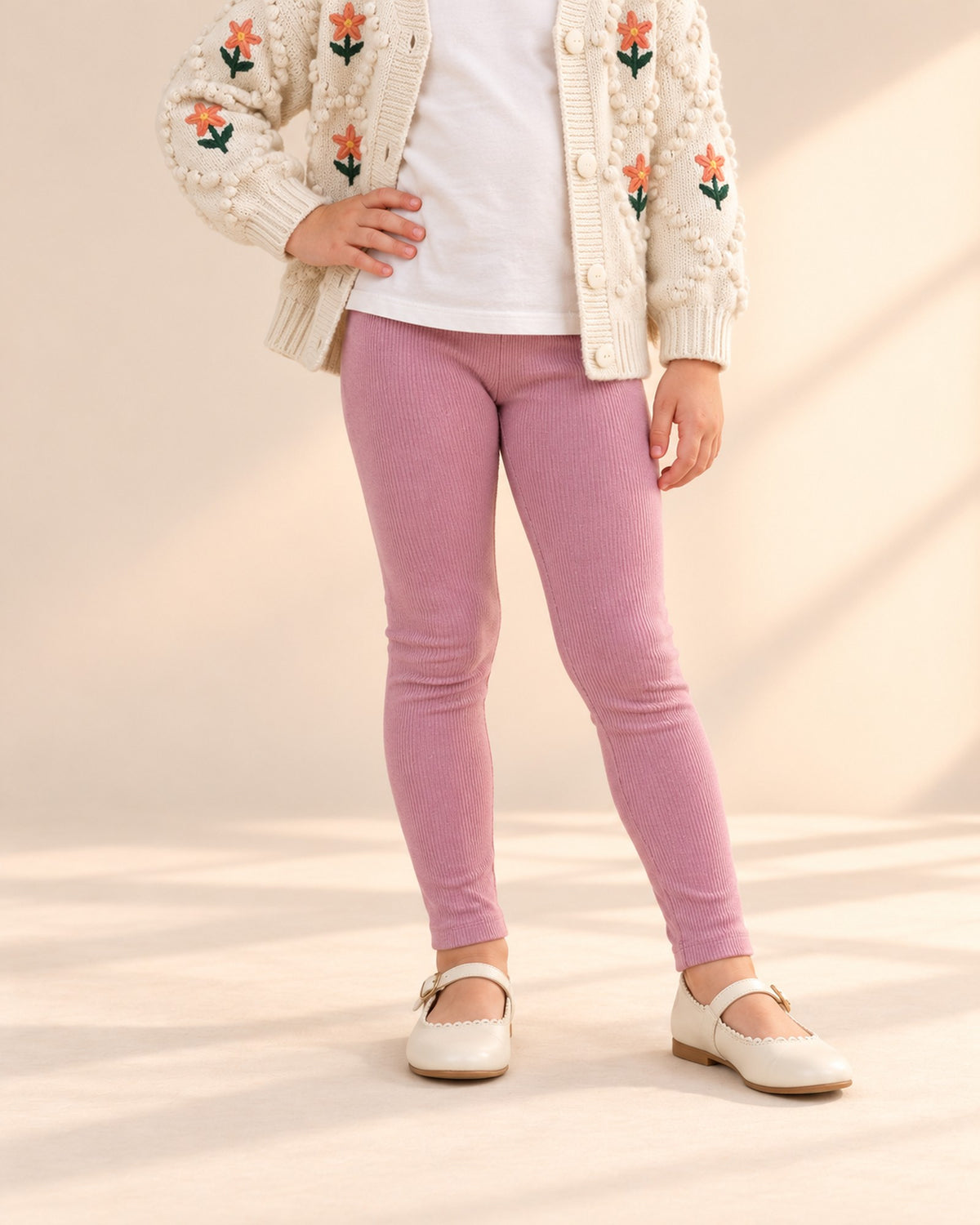 Close-up from chest to feet of soft dusty pink leggings with an elastic waist – Dusty Pink
