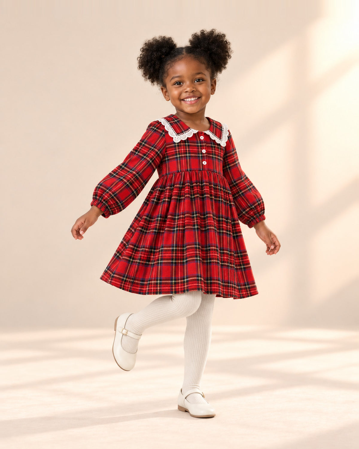 Girl in a natural pose wearing cream ribbed tights and the red tartan dress – Cream