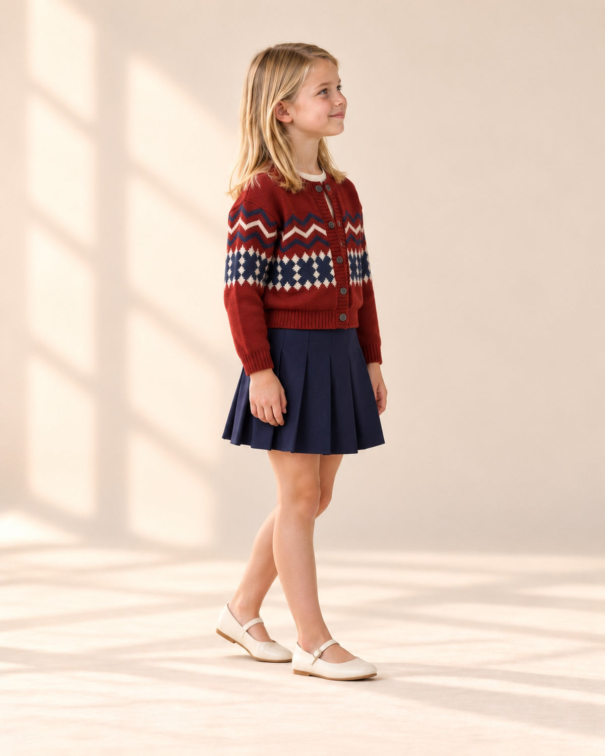 Side view of the navy pleated skirt with the red cardigan – Navy