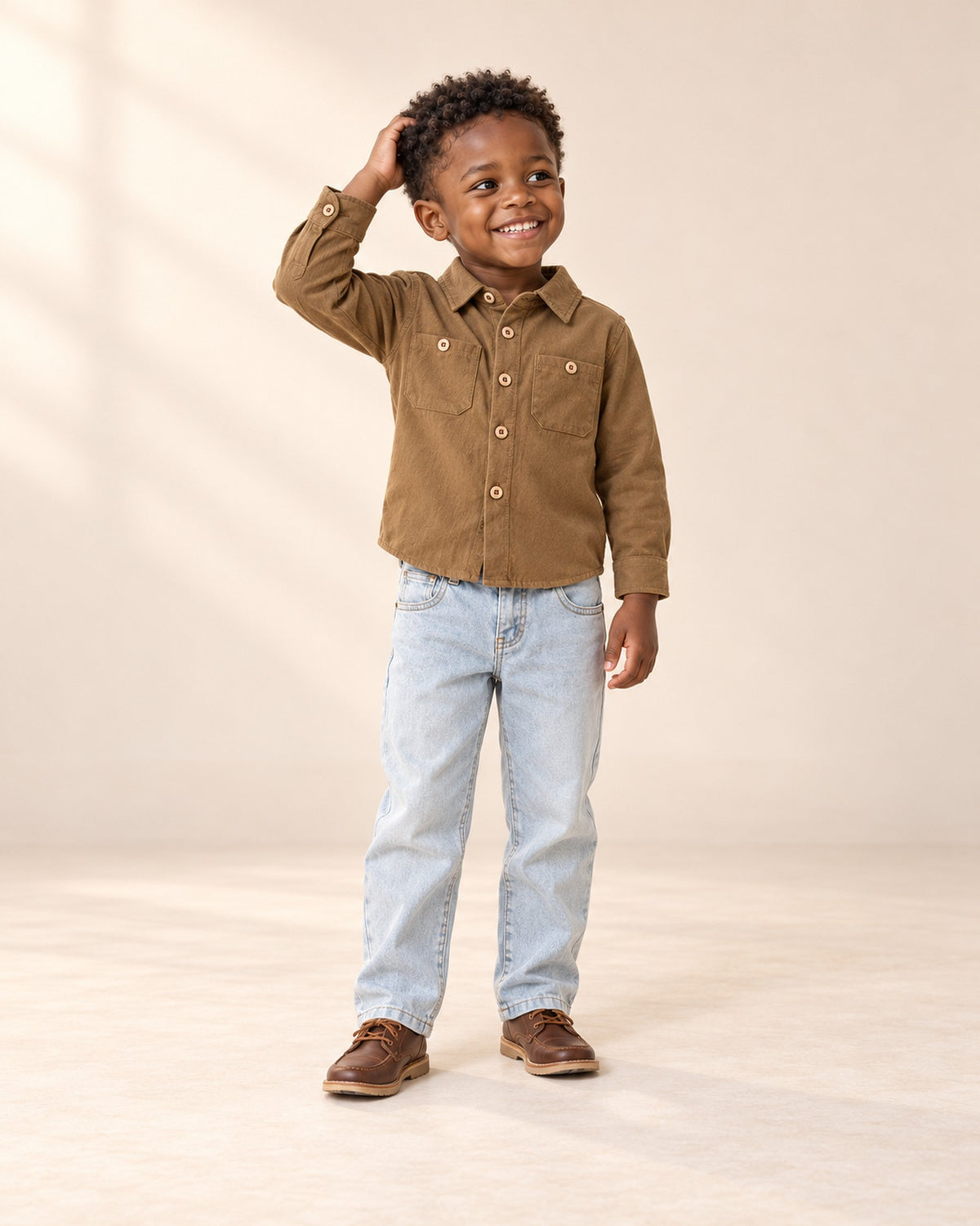 Front view of a boy in the camel pocket shirt with light-wash jeans, full length – Camel