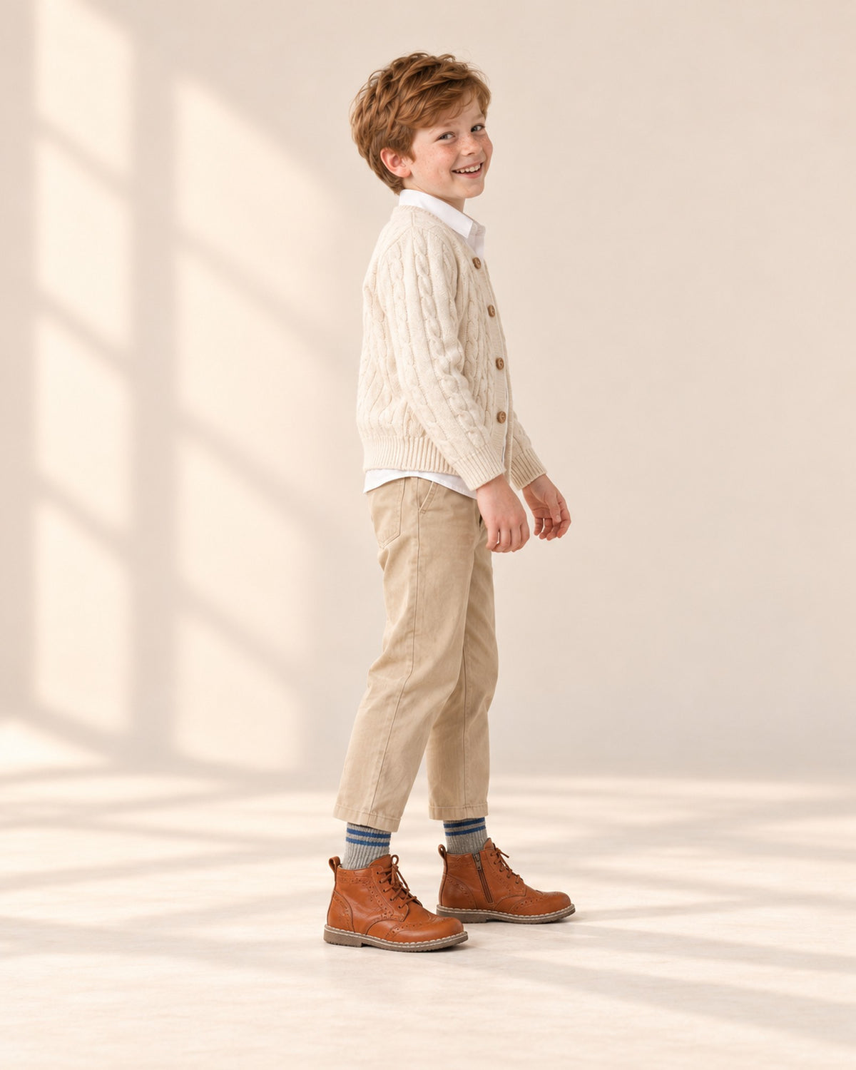 Side view showing the grey heather socks with blue striped cuff above the boots – Grey Heather